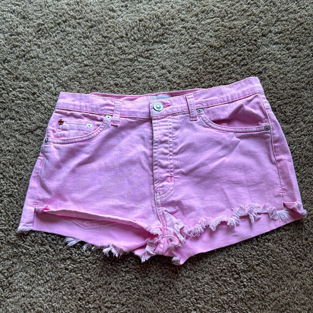 Pepto pink. Cutoff. Denim shorts.